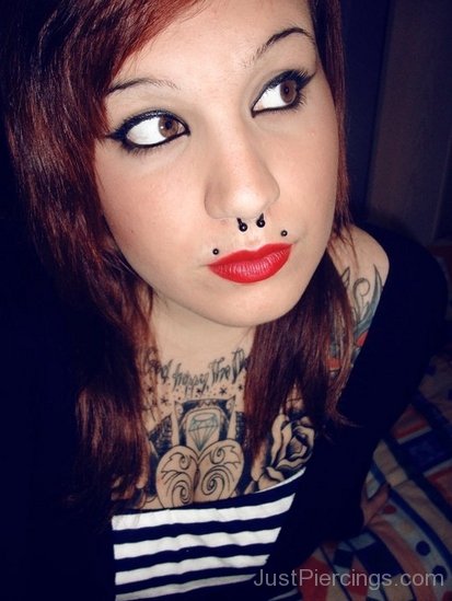 Septum And Angel Bites Piercing With Black Studs