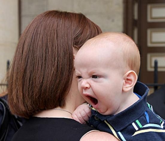 Kid Funny Yawning On Mother Head