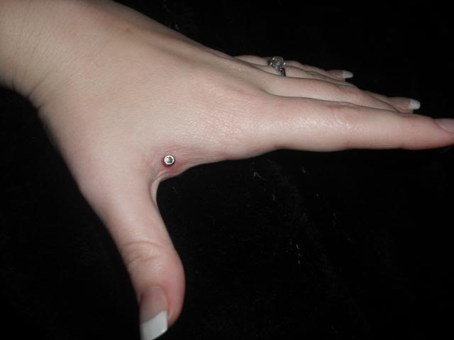 Left Hand Piercing With Dermal Anchor