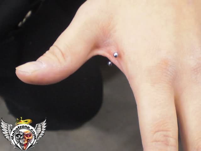 Silver Stud Hand Web Piercing