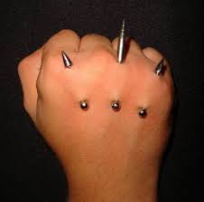 Wolverine Knuckles Hand Piercing