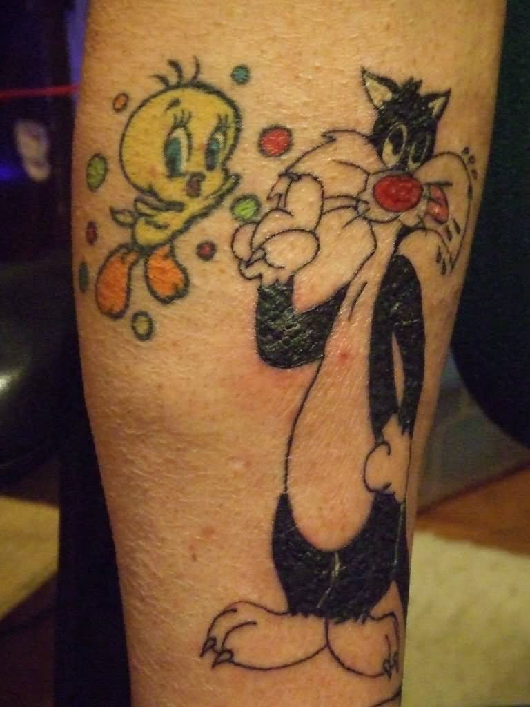 Colorful Tweety And Sylvester Cartoon Tattoo Design