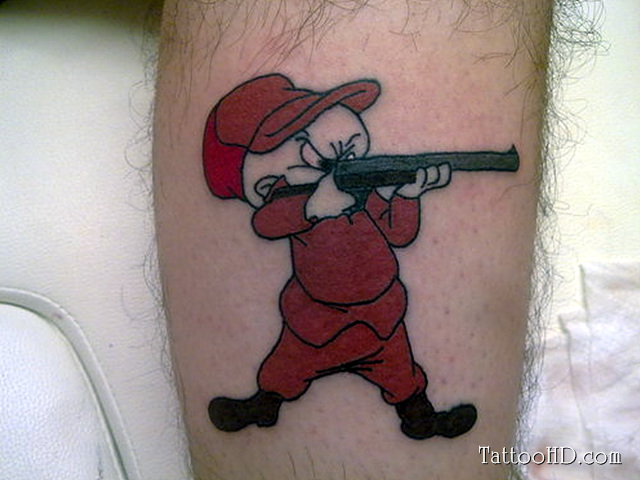 Gun On Elmer Fudd Hand Cartoon Tattoo Design