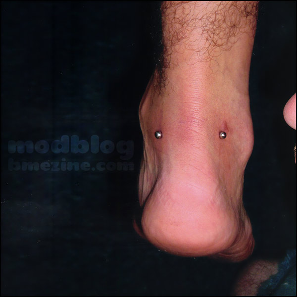 Achilles Piercing Closeup Image