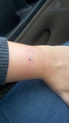 Beautiful Arm Piercing With Silver Dermal