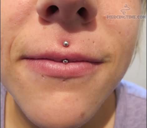 Girl Showing Her Jestrum Piercing