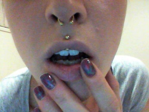 Septum And Jestrum Piercing With Gold Jewellry