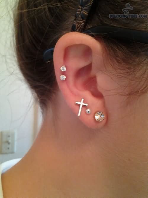 Cross Stud Lobe And Pinna Piercing