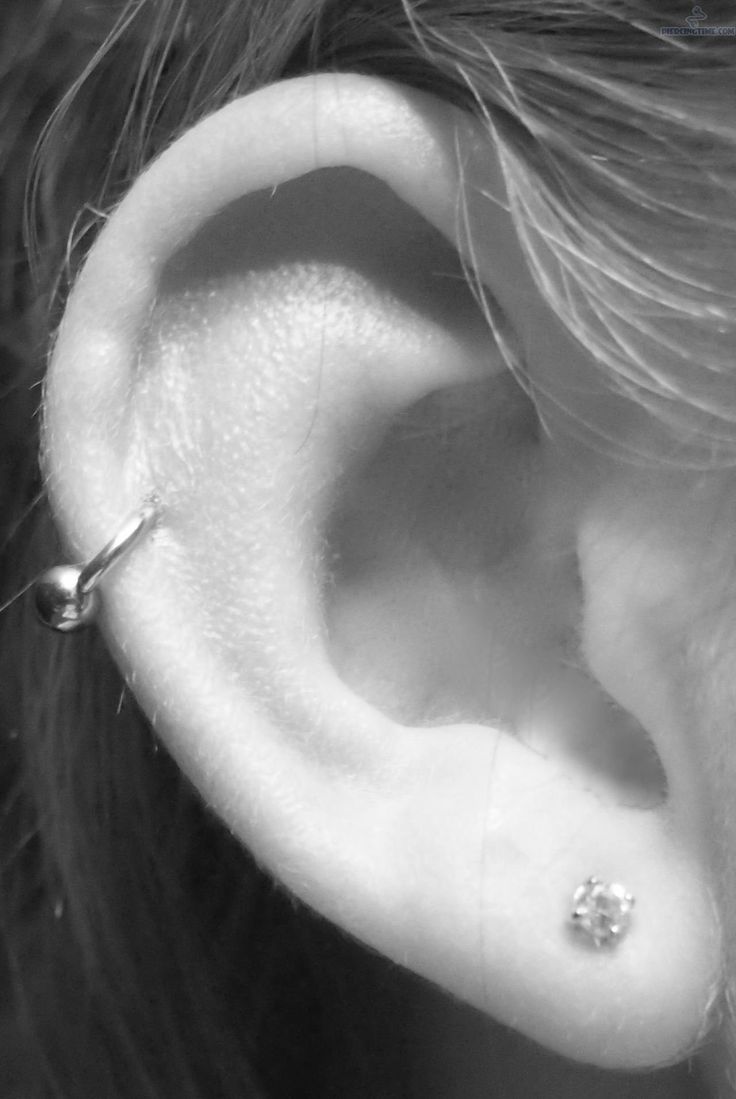 Right Ear Lobe And Pinna Piercing With Bead Ring