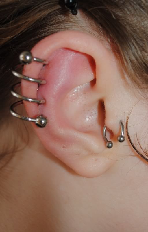 Tragus And Spiral Pinna Piercing For Girls