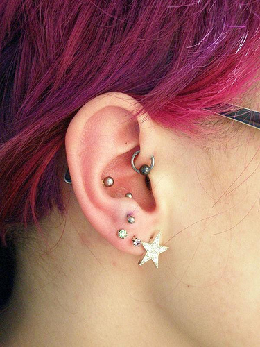 Anti Tragus Piercing With Silver Barbell