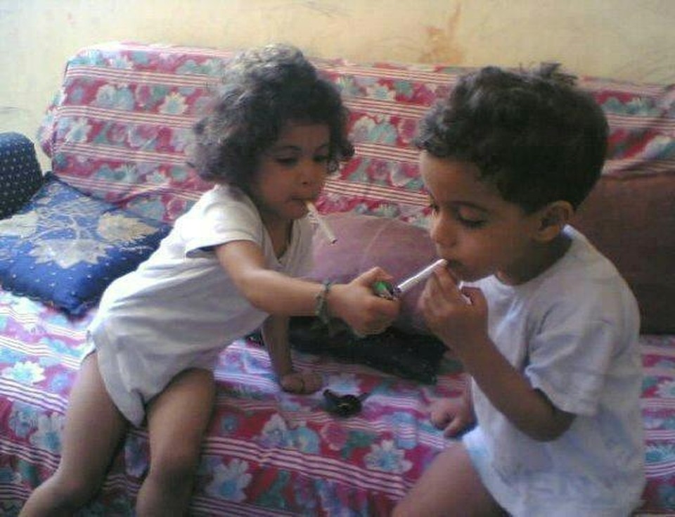 Boy And Girl Funny Babies Smoking Picture