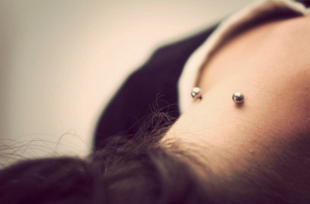 Silver Barbell Girl Nape Piercing Image