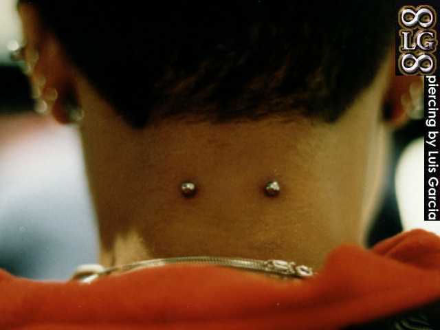 Small Silver Barbell Nape Piercing Idea