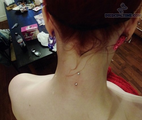 Vertical Barbell Nape Piercing