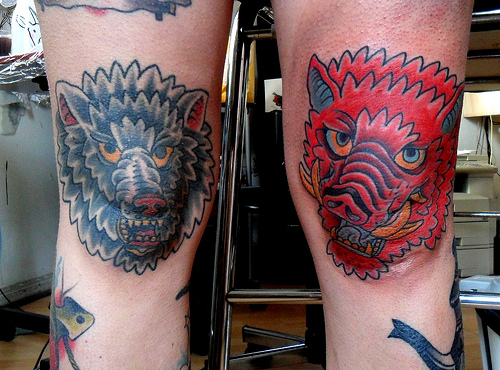 Two Boar Head Tattoo on Both Knee