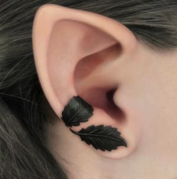 Black Ink Leaf Tattoos On Right Ear