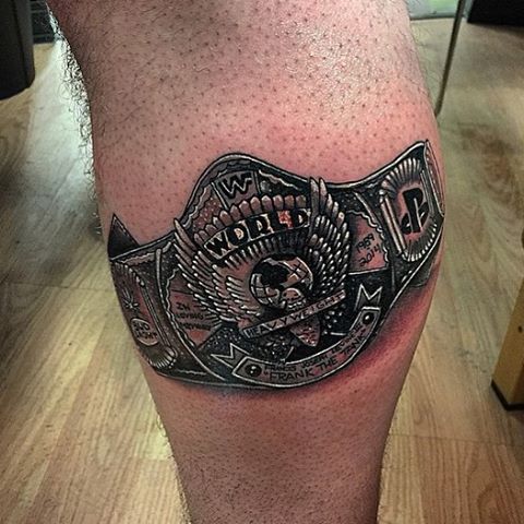 Black Ink Wrestling Belt Tattoo On Leg Calf