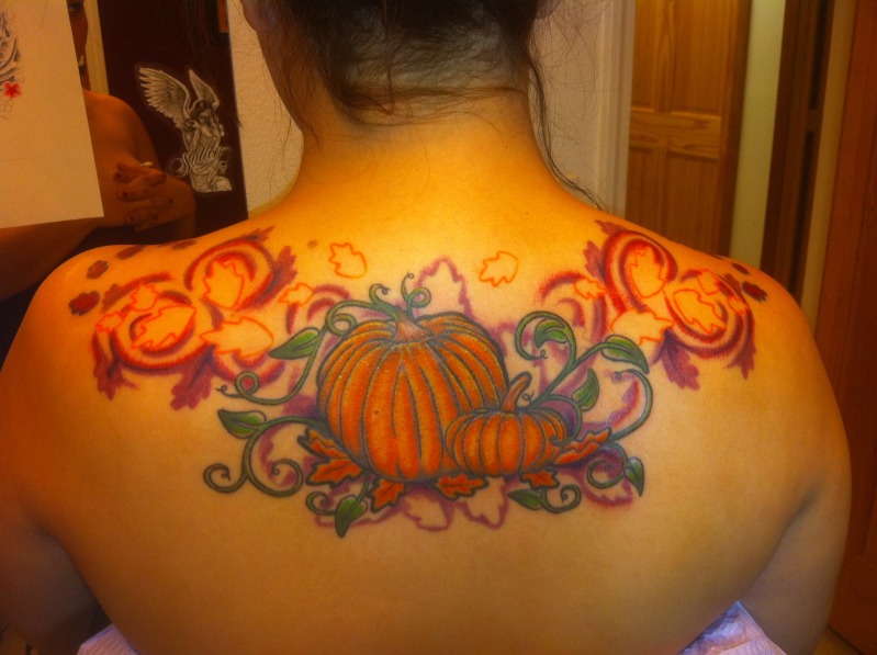 Pumpkin Tattoo On Upper Back by Patheticpeacepirate