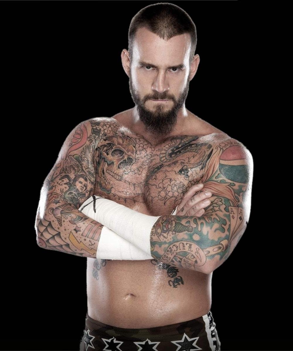 Skull And Snake Tattoo On Wrestler CM Punk Chest