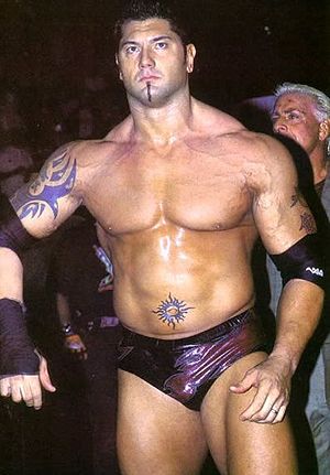 Tribal Sun Tattoo On Wrestler Batista Belly Button