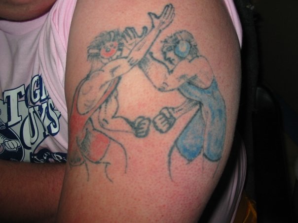 Two Wrestler Fighting Tattoo On Left Half Sleeve