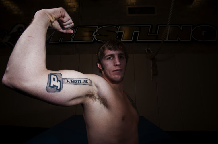 Wrestling Hammer Tattoo On Braden Atwood Bicep