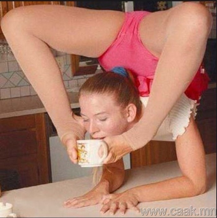 Funny Flexible Girl Drinking Tea