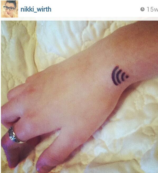 Black Wifi Symbol Tattoo On Upper Wrist