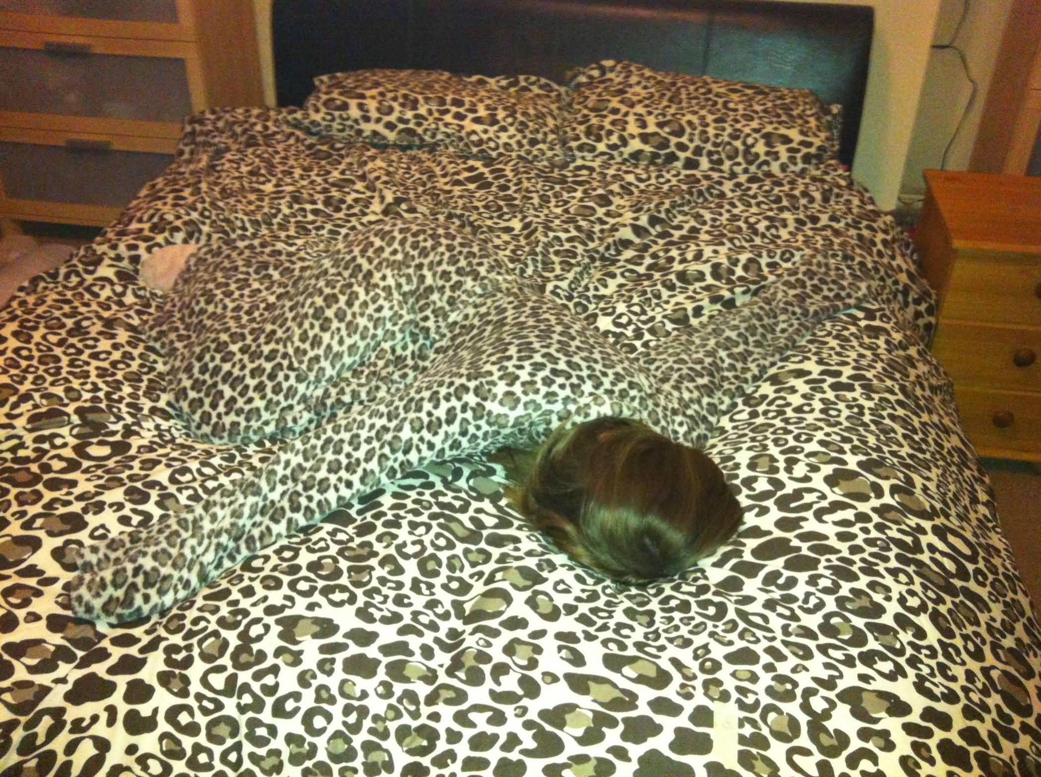 Funny Camouflage Girl On Bed Picture