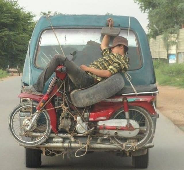 Man Sleeping Behind Car Funny Transportation Picture For Facebook