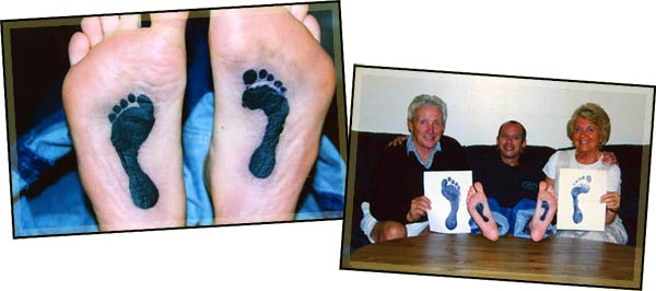 Black Feet Print Tattoo On Under Feet