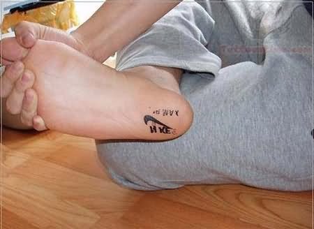 Nike - Nike Logo Tattoo On Under Foot