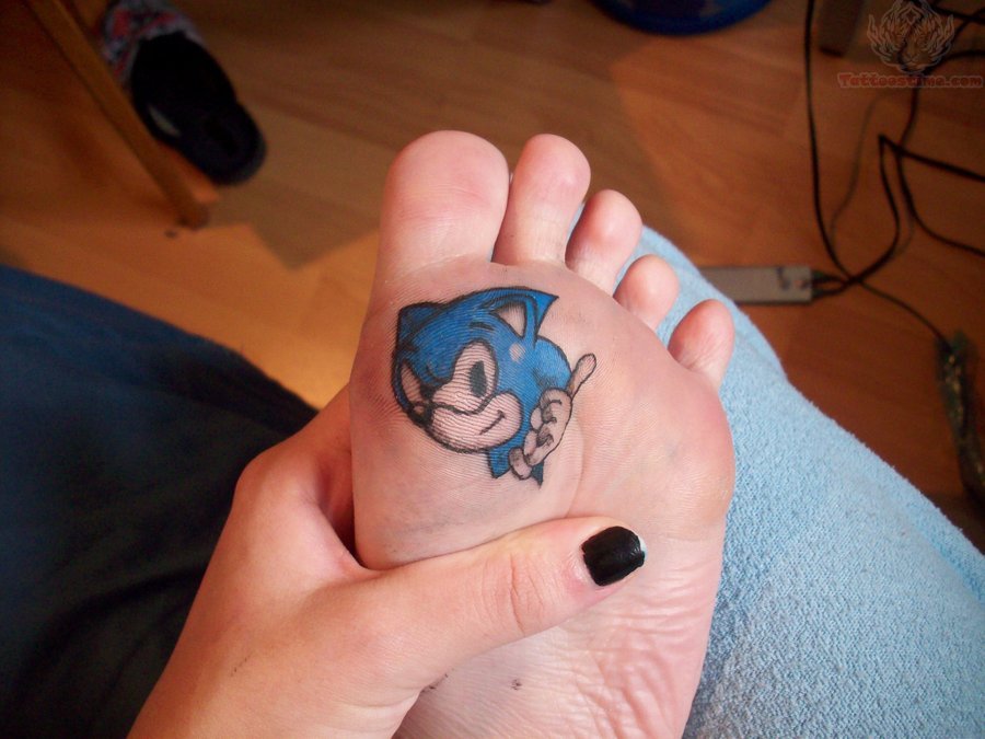 Sonic Head Tattoo On Girl Under Foot