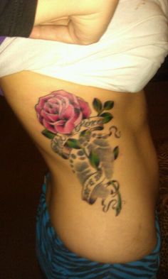 Rose With Footprints And Banner Tattoo Design For Side Rib