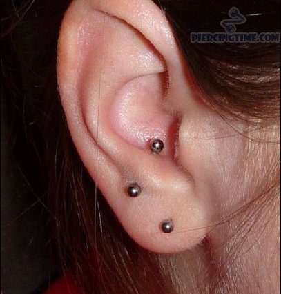 Anti Lobe Piercing With Silver Stud On Right Ear