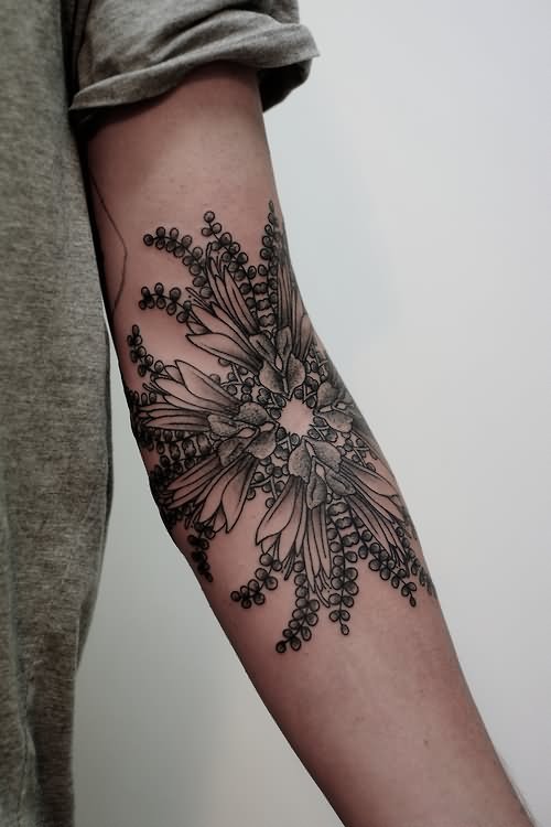 Black Ink Floral Tattoo On Inside Elbow