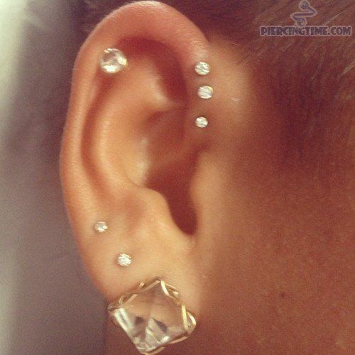 Girl Right Ear Helix And Anti Lobe Piercing