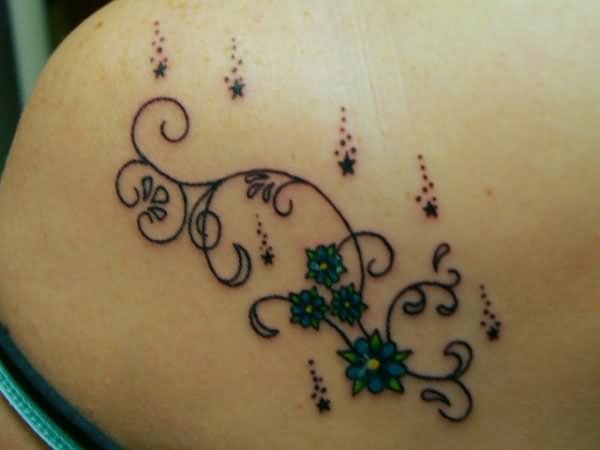 Little Floral Tattoo On Left Back Shoulder