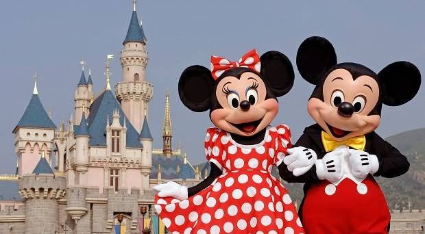 Mickey And Minny Mouse Standing Before Disneyland Paris Castle