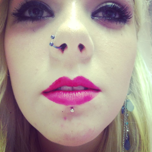 Right Nostril And Center Labret Piercing For Young Girls