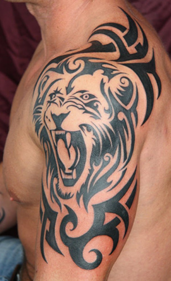 Black Tribal Leo Head Tattoo On Man Left Half Sleeve