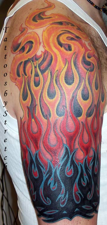 Colorful Tribal Fire And Flame Tattoo On Man Right Half Sleeve