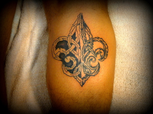 Fleur De Lis Tattoo On Back Leg