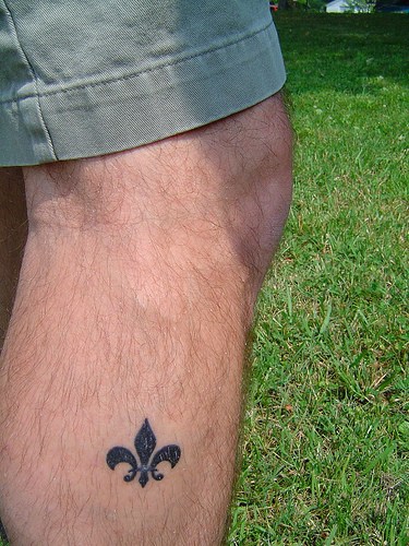 Fleur De Lis Tattoo On Man Right Leg