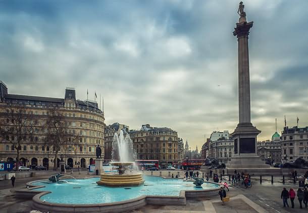 Fountain And Nelson's Statue At The Trafalgar Square