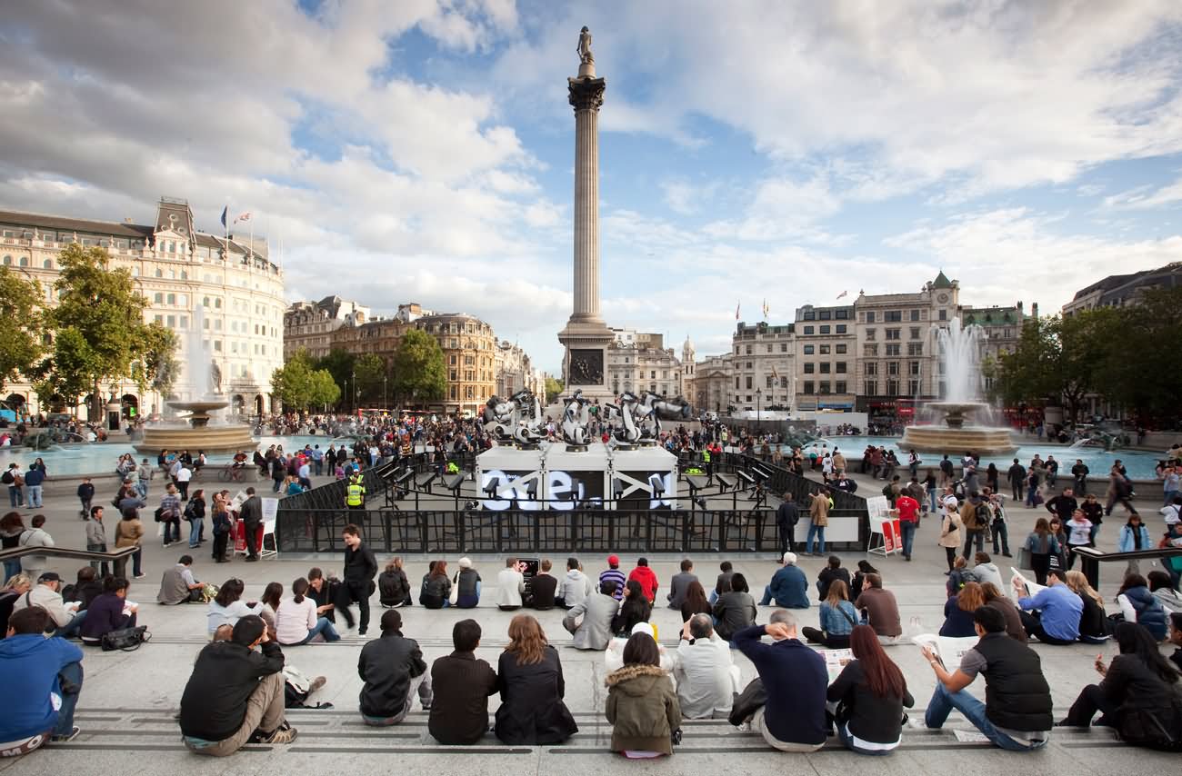 Large Number Of People Enjoying Sunny Day At Trafalgar Square