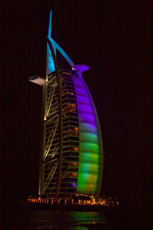 Side View Of The Burj Al Arab at Night