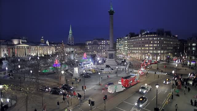 Traffic On Trafalgar Square At Night In London