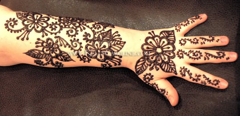 Black Henna Flowers Tattoo On Left Arm And Hand By Danielle Blue